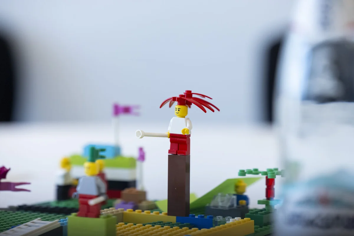 Minifigures and characters on a landscape build