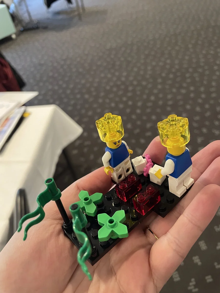 Workshop participants building LEGO Serious Play models together
